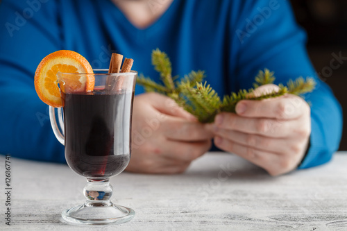 Mulled wine with addition of an orange, honey, cinnamon, a carna photo