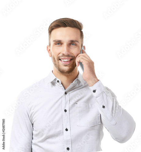 Young businessman with phon...