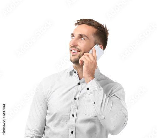 Young businessman with phon...