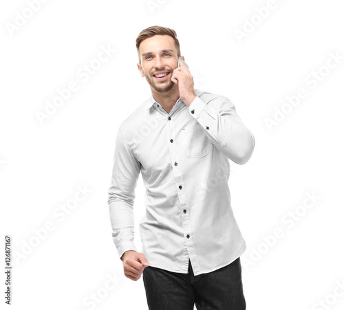 Young businessman with phon...