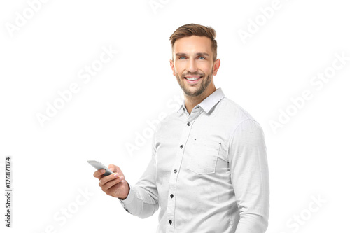 Young businessman with phon...