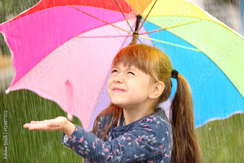 Portrait of cute girl with ...
