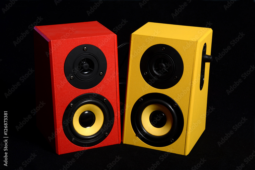 Red and Yellow Audio Speaker on black - Music Concept Stock Photo | Adobe  Stock
