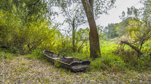 Old boats on the river bank
