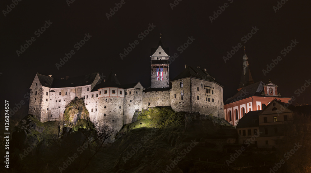 Loket castle in dark night