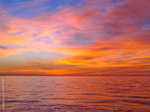 Colorful sunrise with clouds over the sea 6