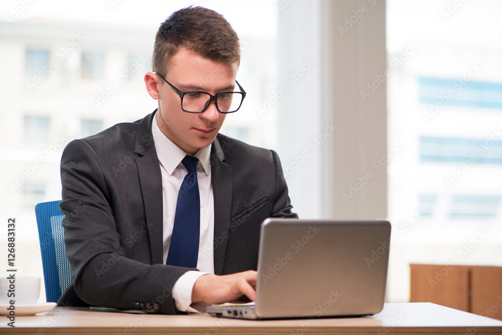 Businessman working with much paperwork Businessman working with much paperwork