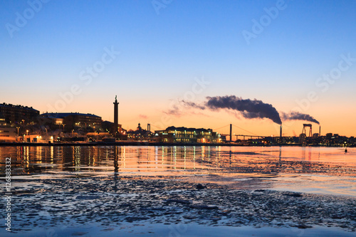 Winter sunset on the frozen sea in Gothenburg Sween