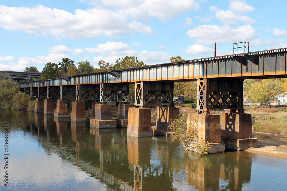 Railroad Bridge Reflected in James River in Richmond