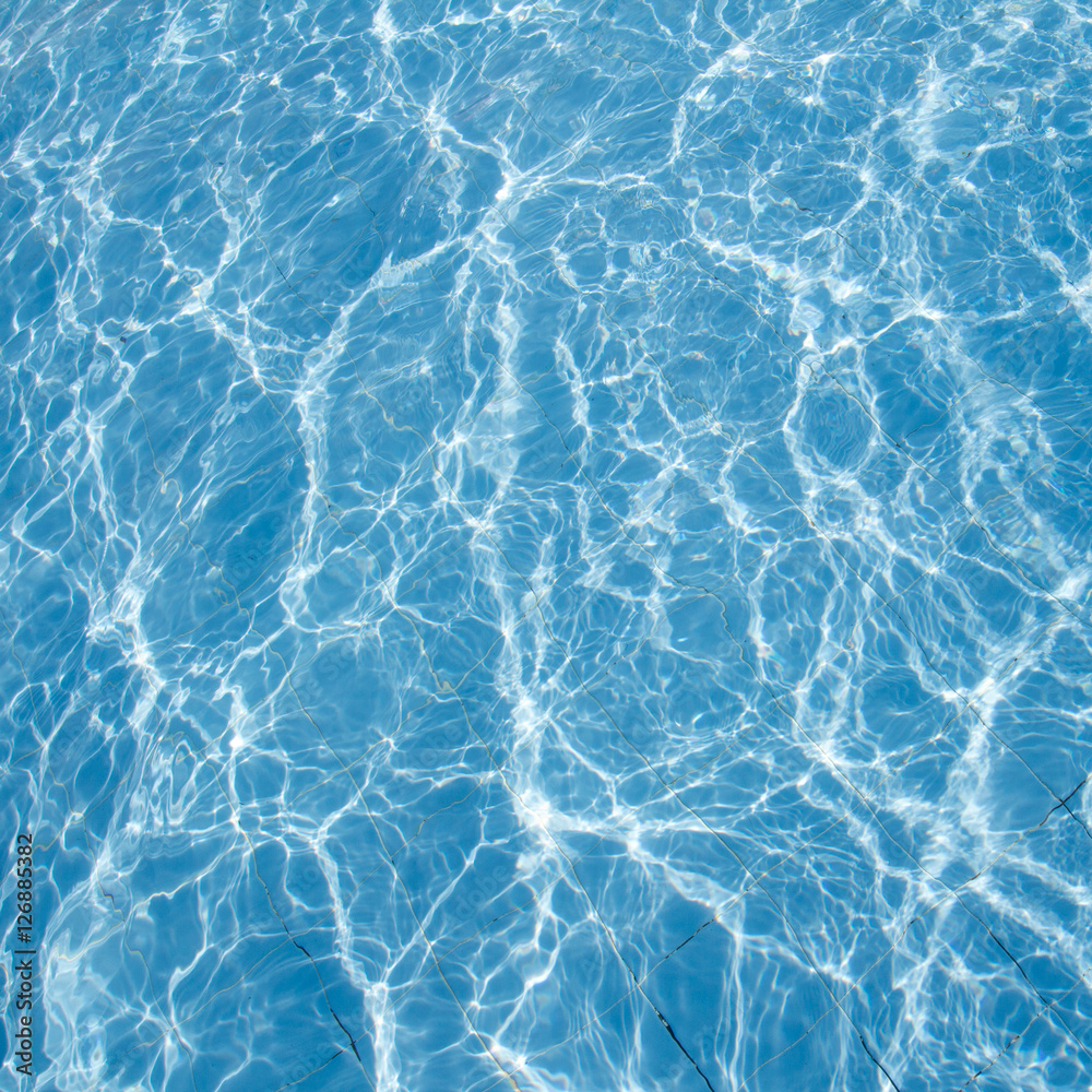 Surface of swimming pool water background Surface of swimming pool water background