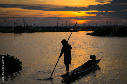 Fishermen in Inle lakes sunset  Myanmar. Fishermen is finish a day of fishing in Inle lake  Myanmar  Burma . Inle is one of the most favorite tourist places in Myanmar  Burma 