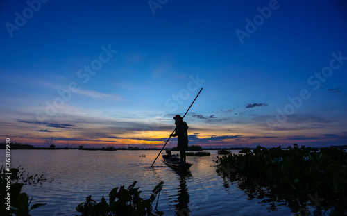 Fishermen in Inle lakes sunset, Myanmar. Fishermen is finish a day of fishing in Inle lake, Myanmar (Burma). Inle is one of the most favorite tourist places in Myanmar (Burma)