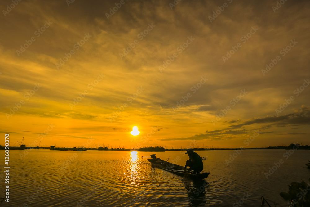 Fishermen in Inle lakes sunset, Myanmar. The villagers went out to fish early in the morning.