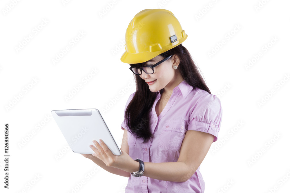 Young architect using a digital tablet Young architect using a digital tablet