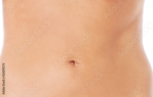 Slim nude young woman belly