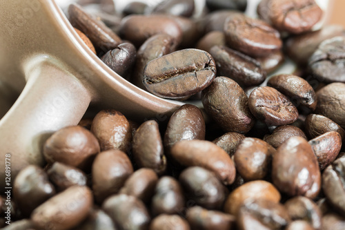 Coffee beans in coffee cup