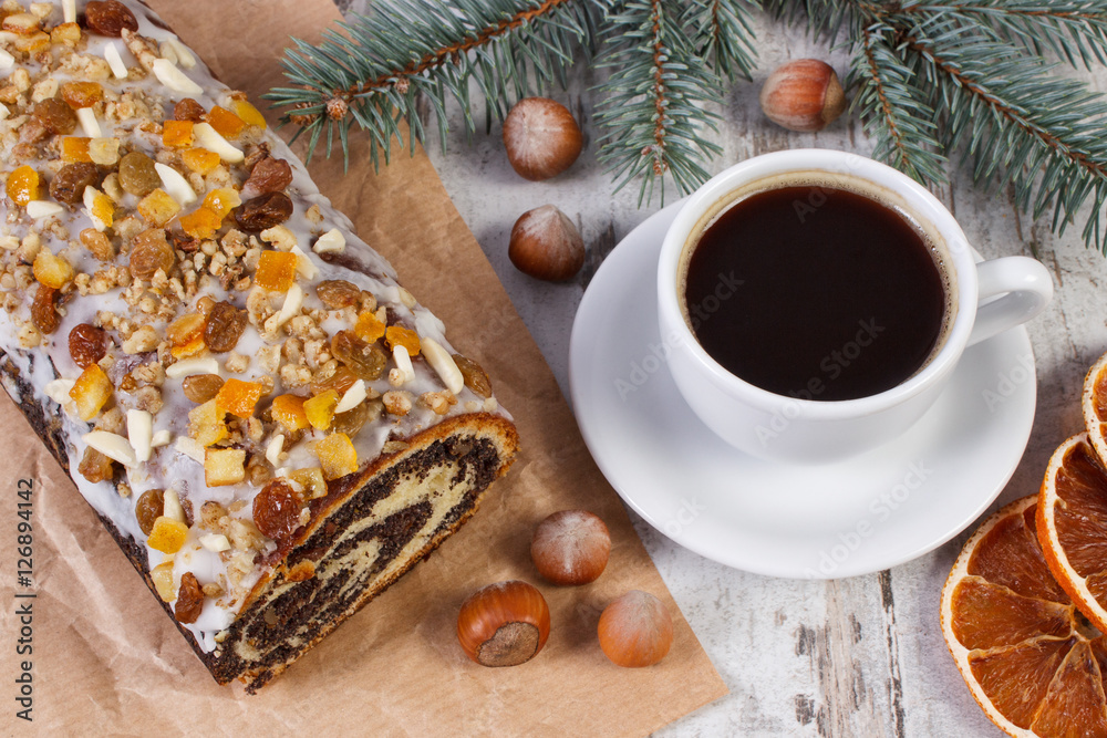 Poppy seeds cake, cup of coffee and spruce branches, dessert for Christmas Poppy seeds cake, cup of coffee and spruce branches, dessert for Christmas