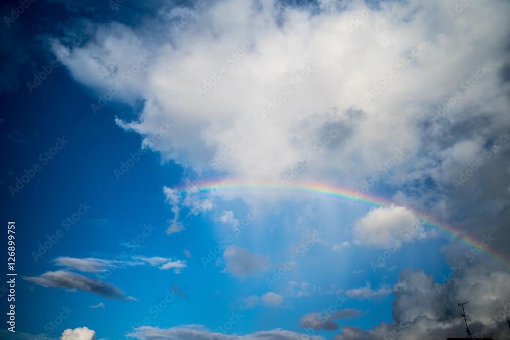 Rainbow and cloud