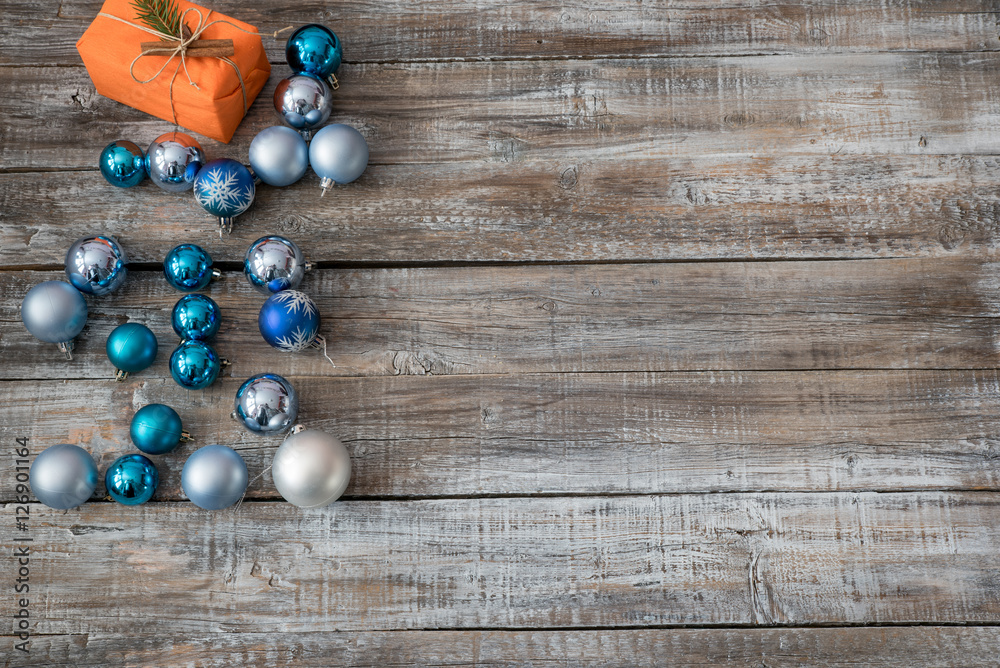 Christmas decorations on a wooden background, top view with copy Christmas decorations on a wooden background, top view with copy