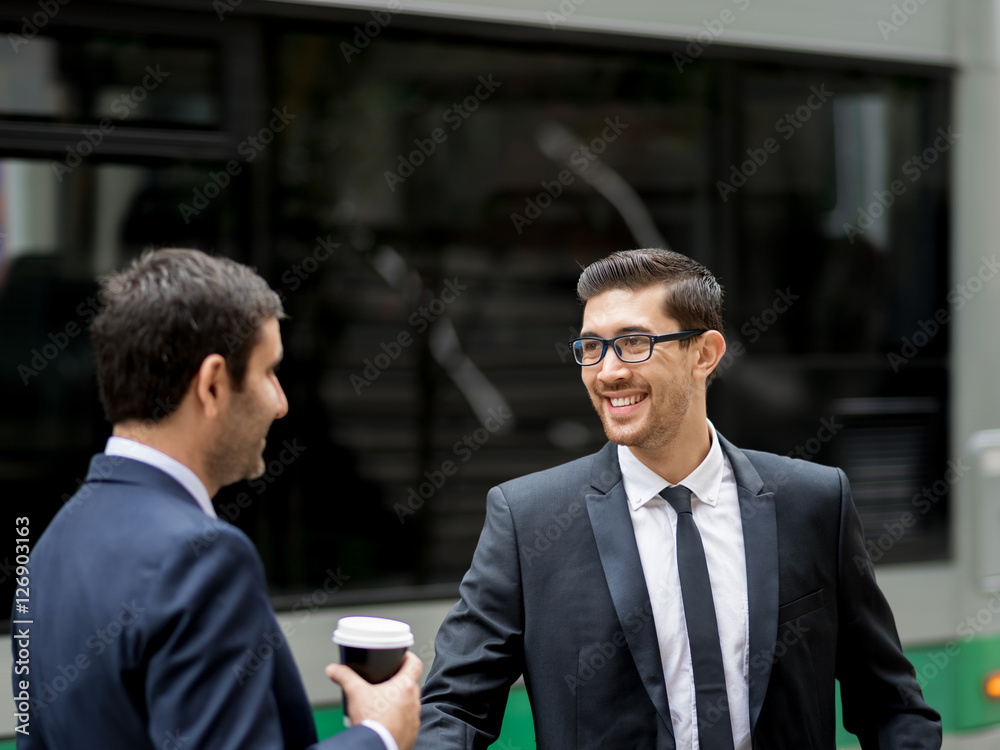 Two businessmen talking outdoors Two businessmen talking outdoors