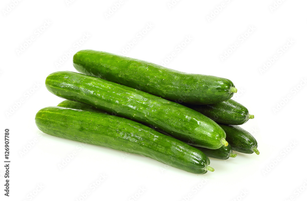 Healthy food. The green cucumbers isolated on white background Healthy food. The green cucumbers isolated on white background