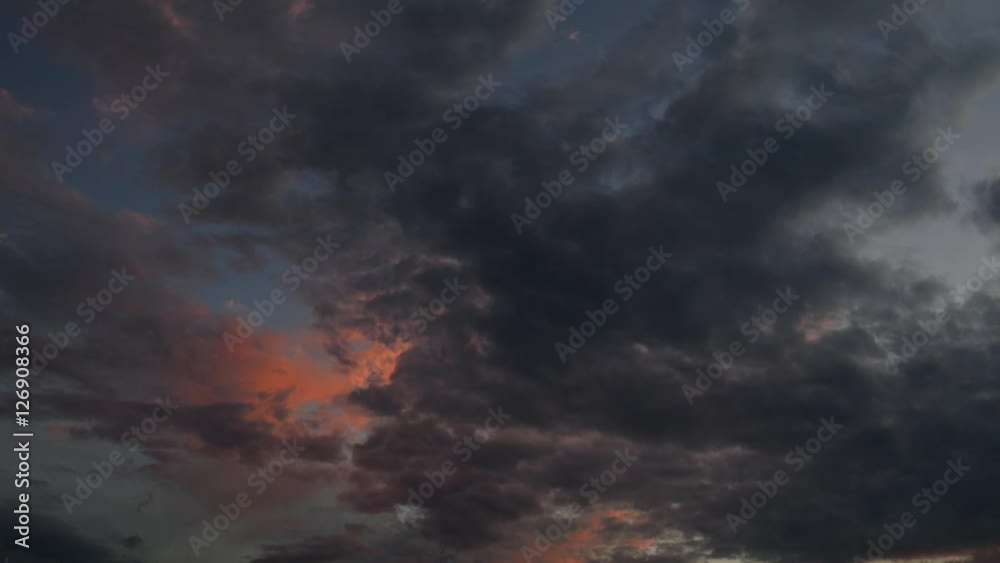 Moving clouds on sky. Sunset. Nature background.
Moving clouds on sky. Sunset. Nature background.