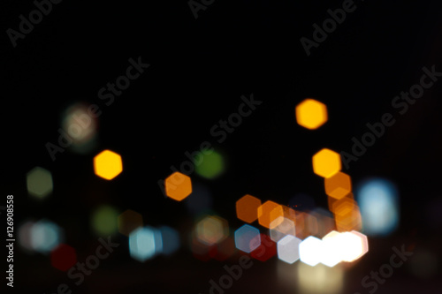 Bokeh colorful abstract defocused city on street