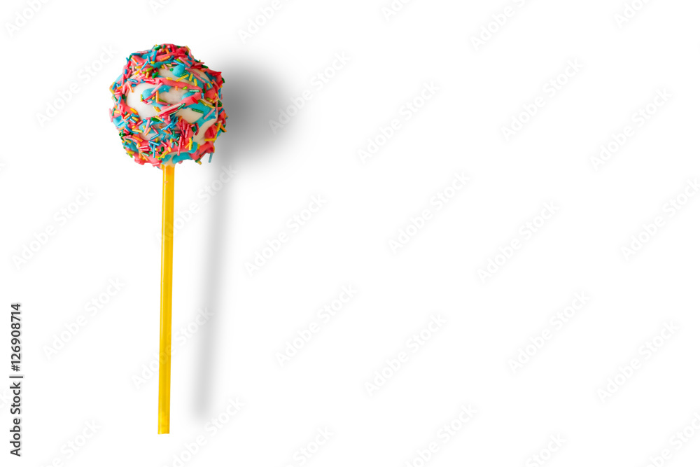 Cake pop with sprinkles. Candy on white background. Eat well and have fun. Boost your mood. Cake pop with sprinkles. Candy on white background. Eat well and have fun. Boost your mood.