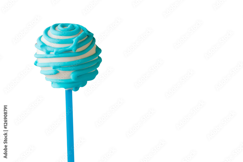 Candy on white background. Cake pop with blue icing. Tasty dessert with soft filling. Relax and enjoy the flavor.