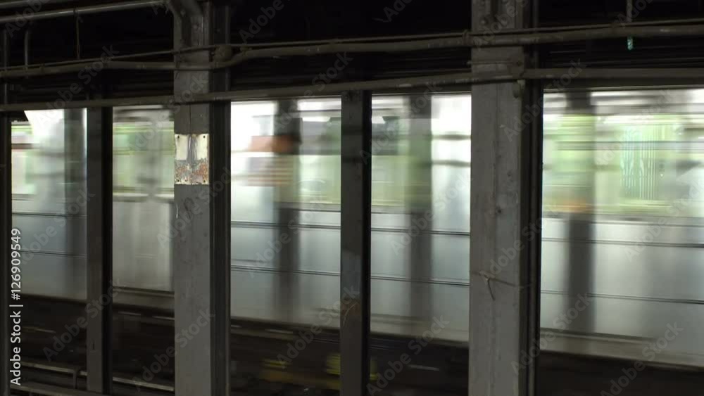 Seamless loop NYC subway train background video, motion blur, can be repeated as long as you need it, for travel backgrounds or green screen replacements