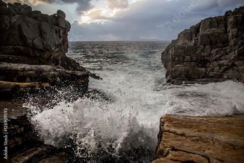 waves crashing on rocks