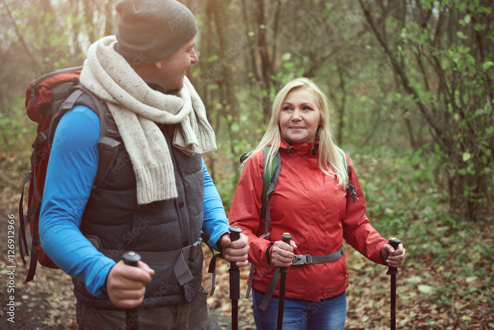 Chatting while hiking in the forest Chatting while hiking in the forest