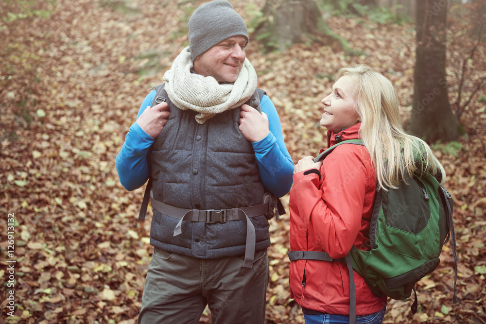 Adult man and woman in the forest Adult man and woman in the forest