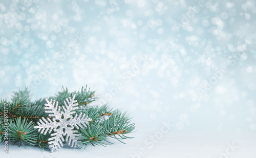 Christmas decorations on abstract winter background.