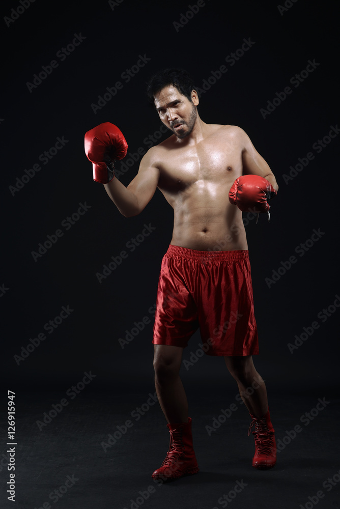 Portrait of asian guy boxer is celebrating his winning