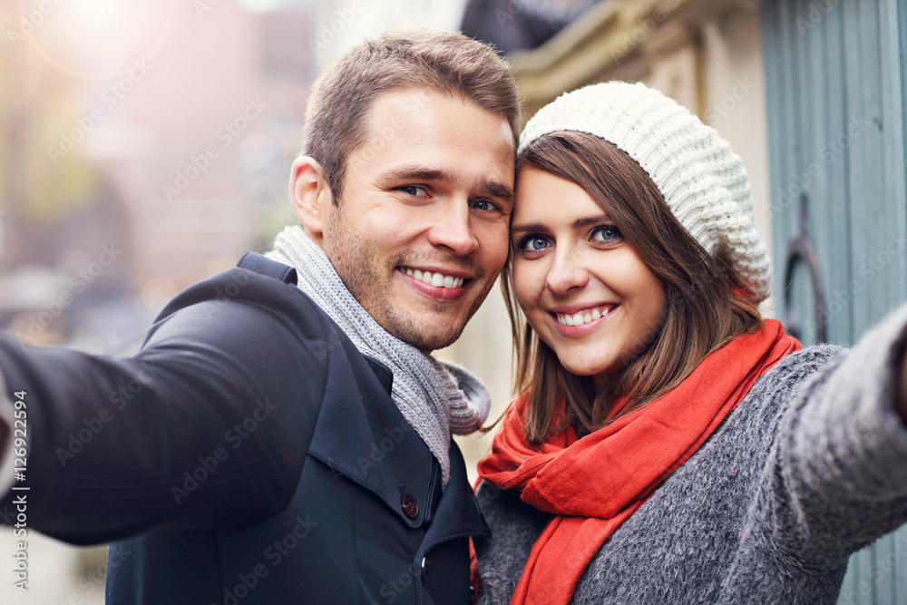 Young couple taking selfie in the city Young couple taking selfie in the city
