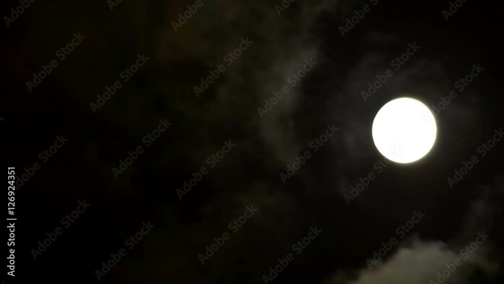 The moon in the night sky. Timelapse shooting. The moon in the night sky. Timelapse shooting.