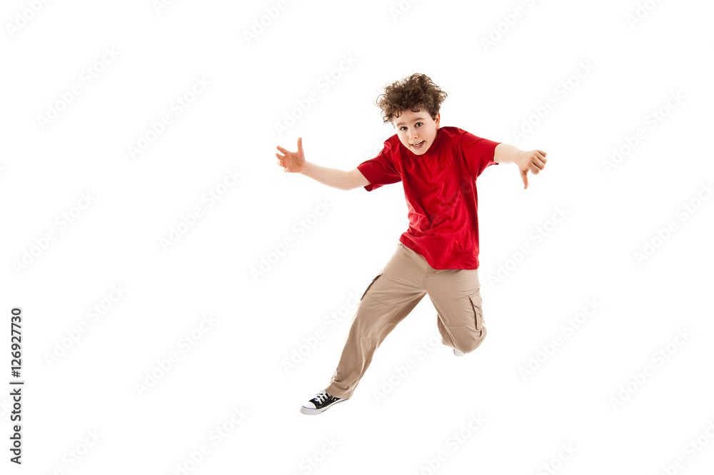 Boy jumping, running isolated on white background 