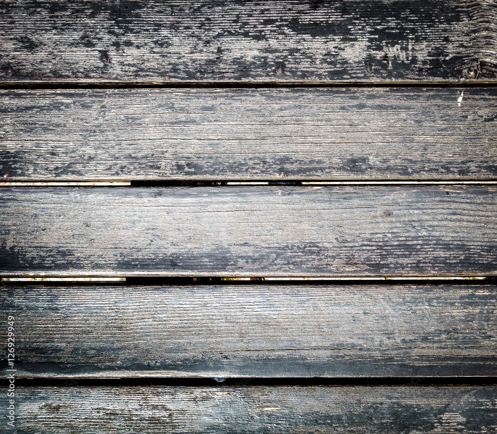 Old weathered wood planks outside flooring texture background.
