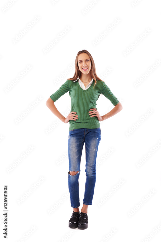 Happy girl with hands on hips in the studio over white backgroun Happy girl with hands on hips in the studio over white backgroun