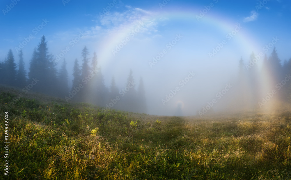 Ukraine. Carpathians. Brocken Spectre with a rainbow in the mist