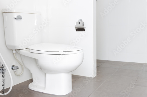 Modern design home bathroom White flush toilet in the bathroom