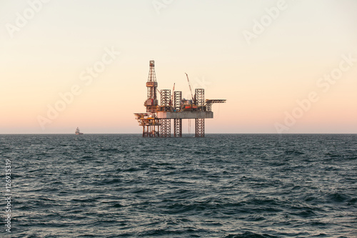 Oil and gas jack up drilling rig in the ocean sea from oil and gas industrial petroleum. This rig is Jack up rig type photo