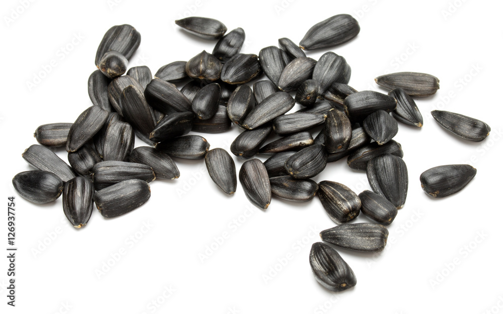 Sunflower seeds isolated on white background close up Sunflower seeds isolated on white background close up