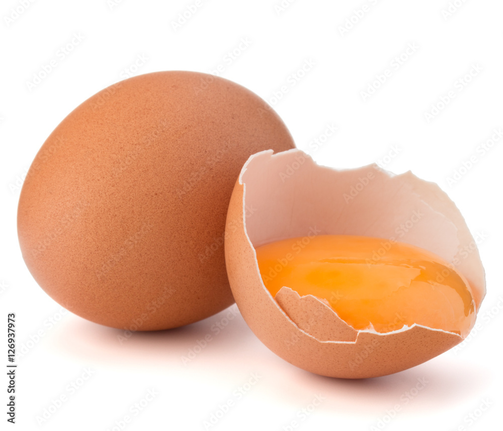 Broken egg in eggshell half and raw egg isolated on white backgr Broken egg in eggshell half and raw egg isolated on white backgr