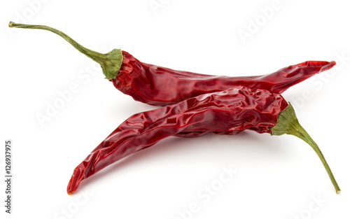 Dried red chili or chilli cayenne pepper isolated on white  back