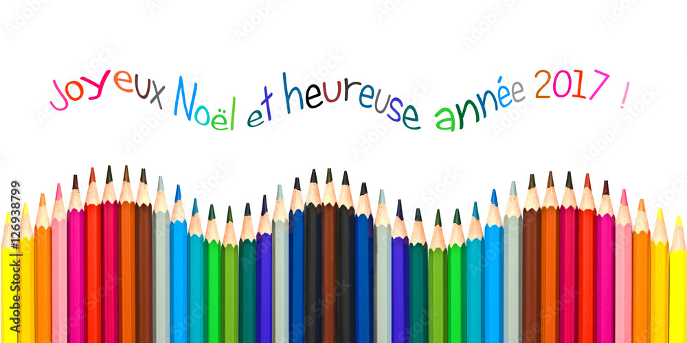 Fototapeta Kartkę z życzeniami z tekstem w języku francuskim oznaczającym kartkę z życzeniami szczęśliwego nowego roku 2017, kolorowe ołówki na białym tle