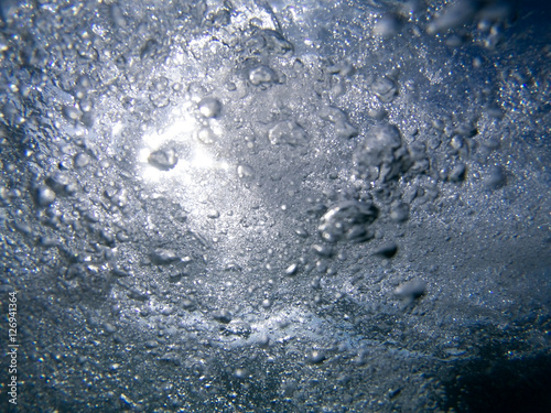  underwater scene with air bubbles under water © Glebstock