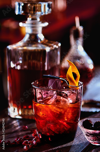 Fotografie Alcoholic cocktail with rum, pomegranate and grenadine