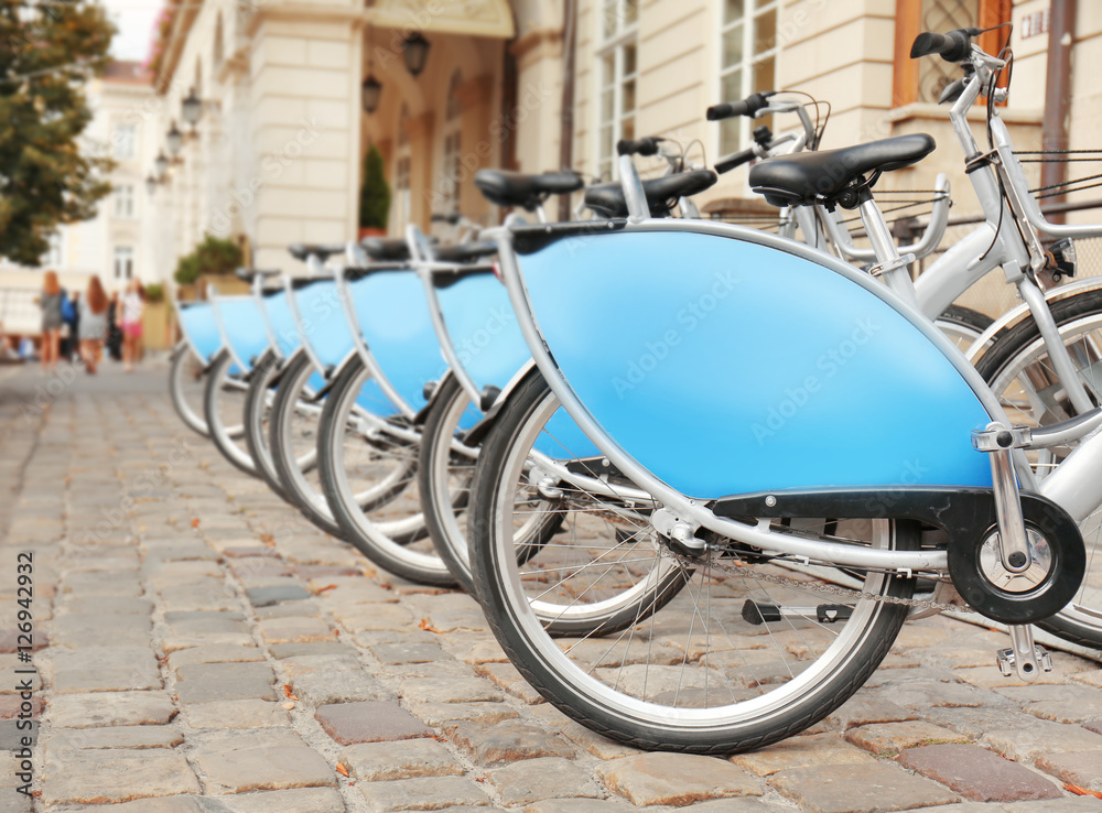 Obraz premium Parking place of bicycles for rent outdoors